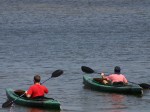 boys in kayaks